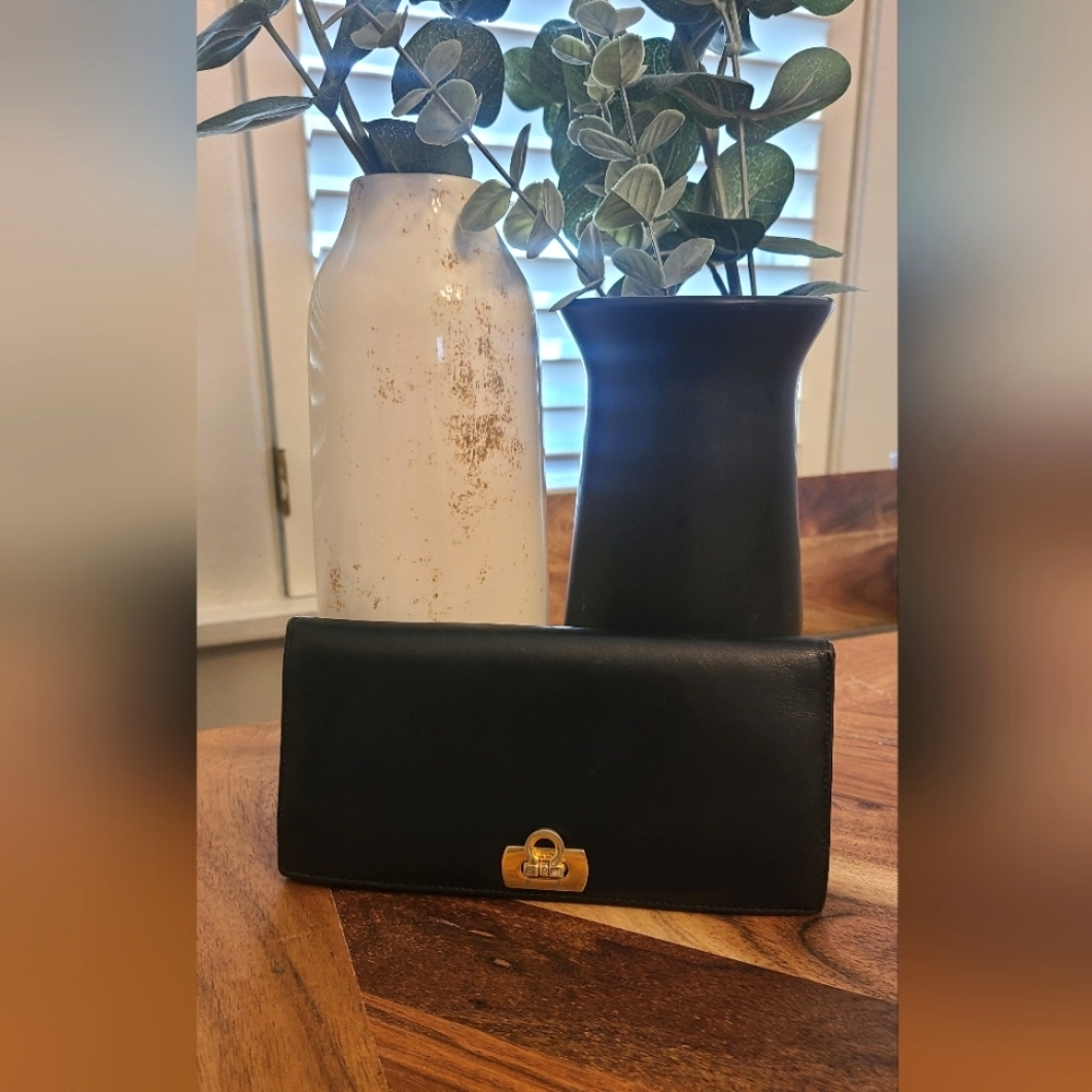 Salvatore Ferragamo Gancini Black Leather wallet with gold hardware EUC